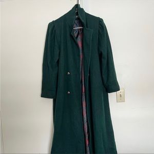 Deep green wool jacket with ruched shoulder detail